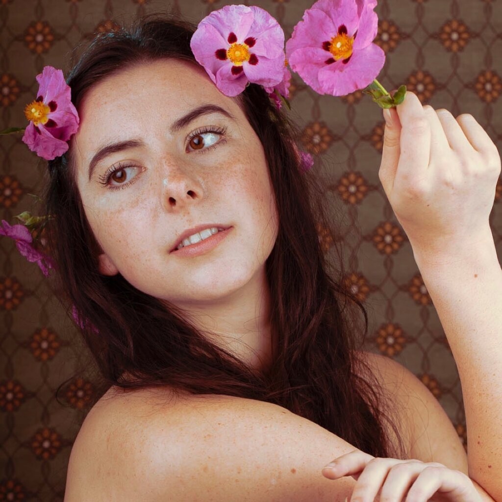 A person holding flowers.