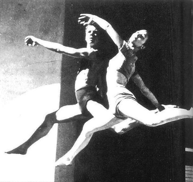 A black and white photo of two dancers.