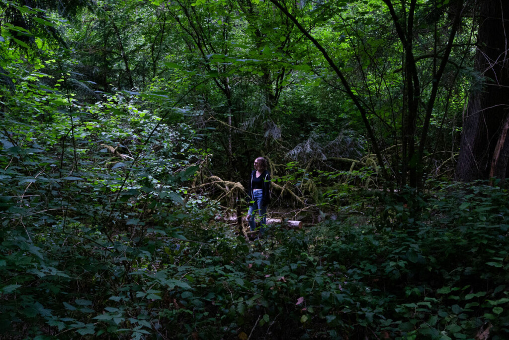 A person in a forest. 