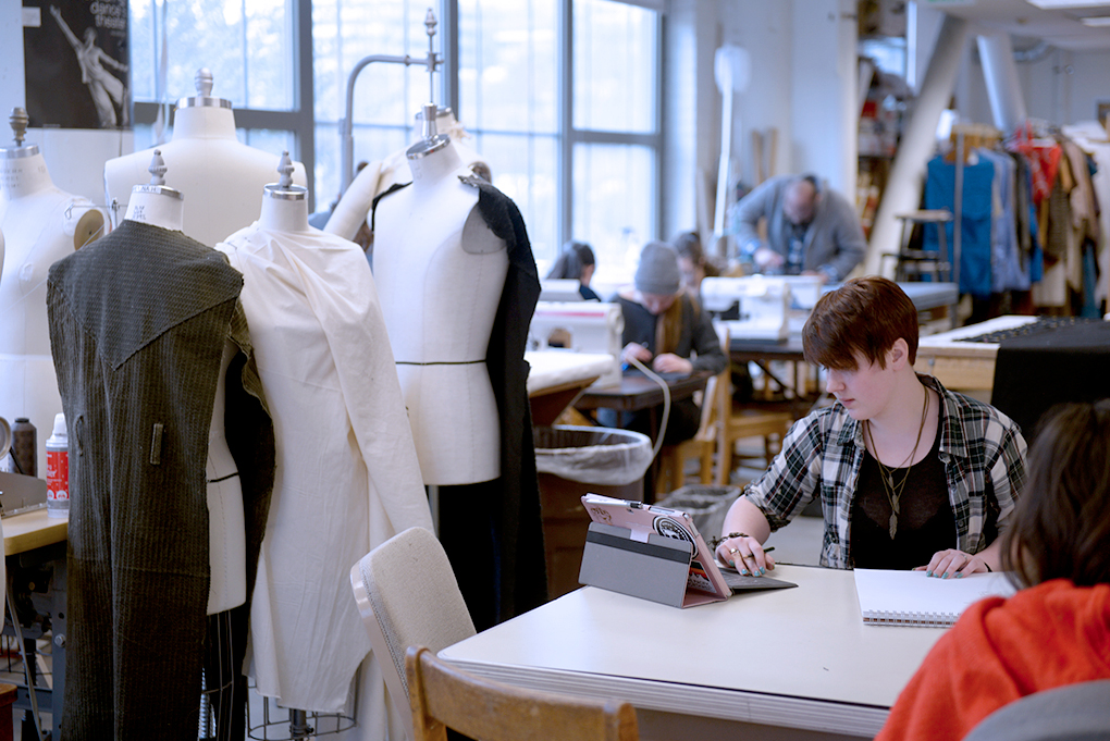 Performance Production student working on Costume Design in large studio with mannequins