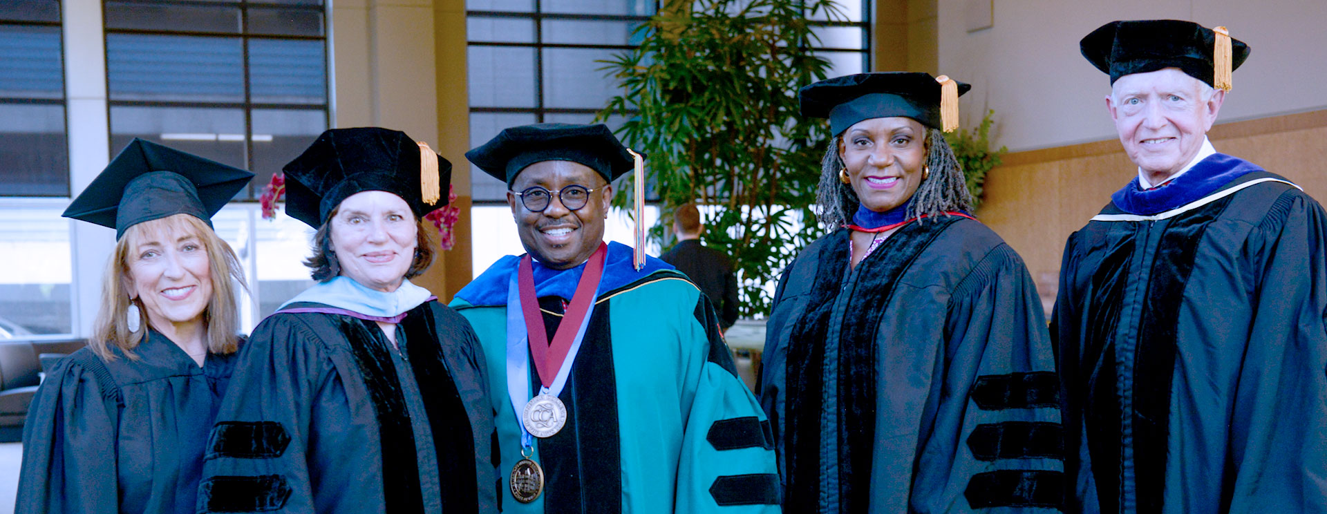 President Raymond Tymas-Jones with board members