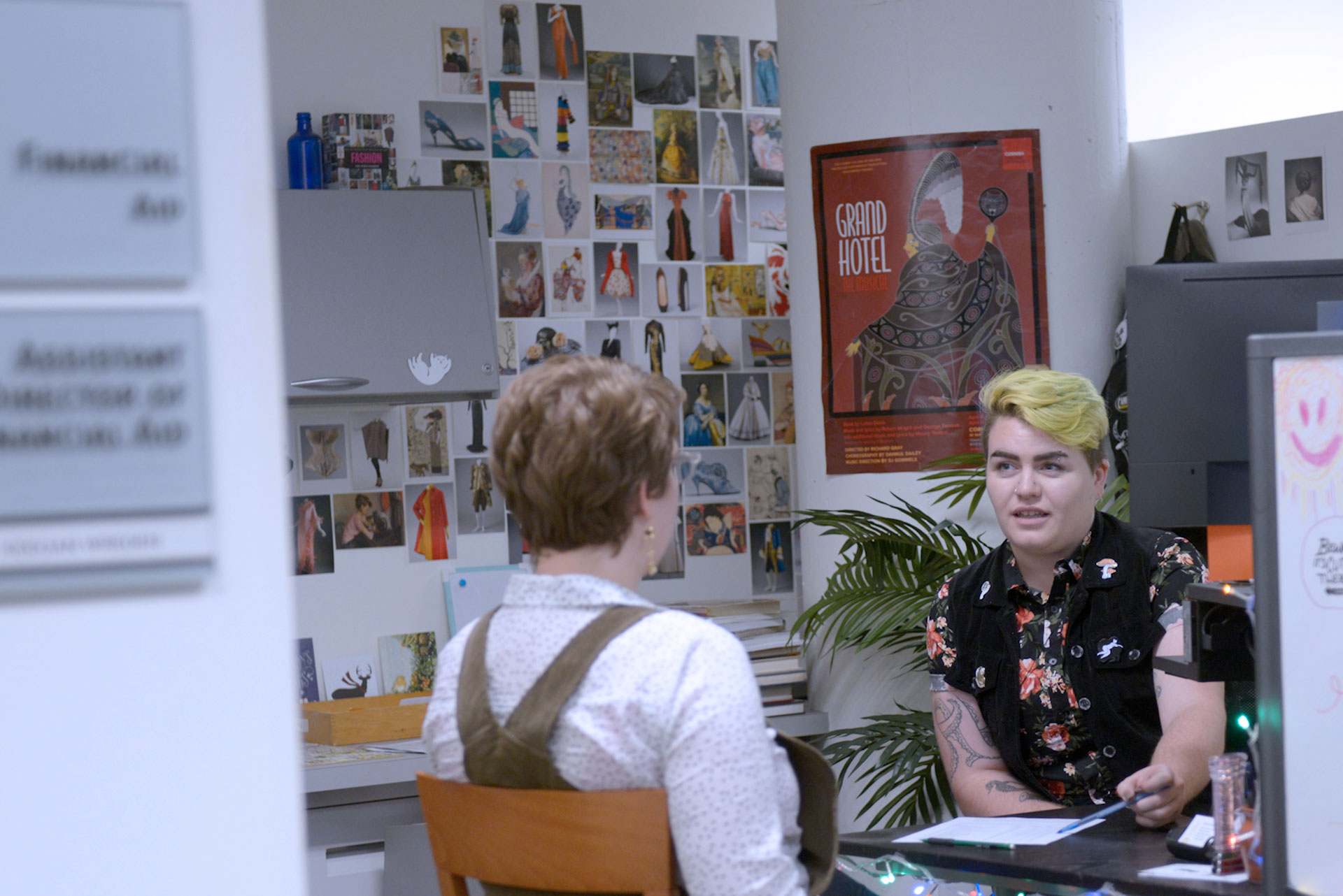 Student talks with Financial Aid Counselor