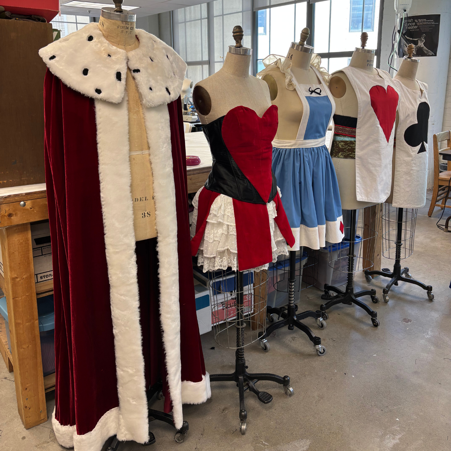 costumes on rolling mannequins
